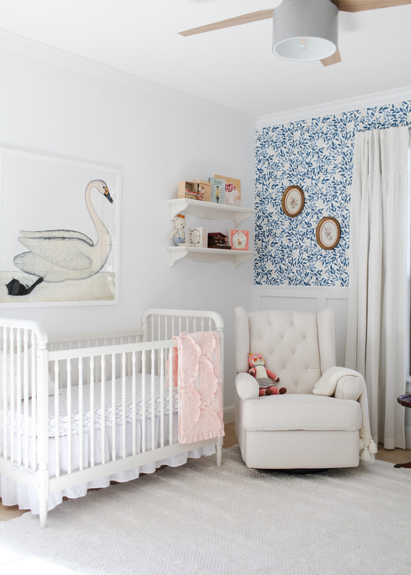 Baby girl nursery. wall decor, bedding, curtains, rugs, furniture, wallpaper, wainscoting, toys, art.